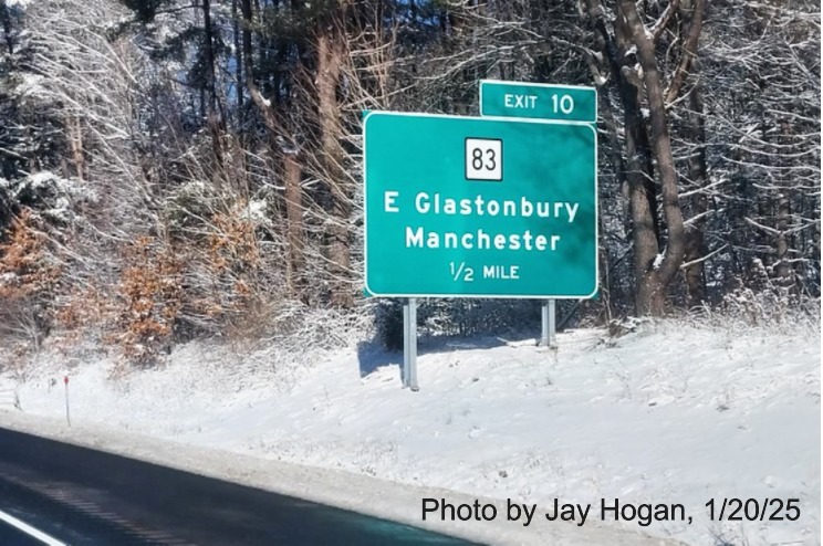 Image of ground mounted ramp sign for CT 83 with milepost based
	  exit number that matches old number on CT 2 West in East Glastonbury, by Jay Hogan, January 2025