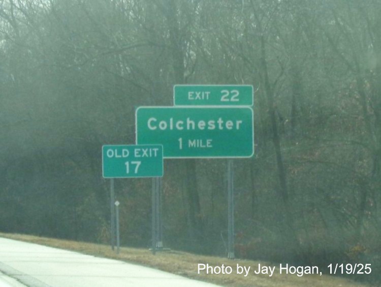 Image of ground mounted 1 Mile advance sign for Colchester exit with new milepost based
	  exit number on CT 2 East in Colchester, by Jay Hogan, January 2025