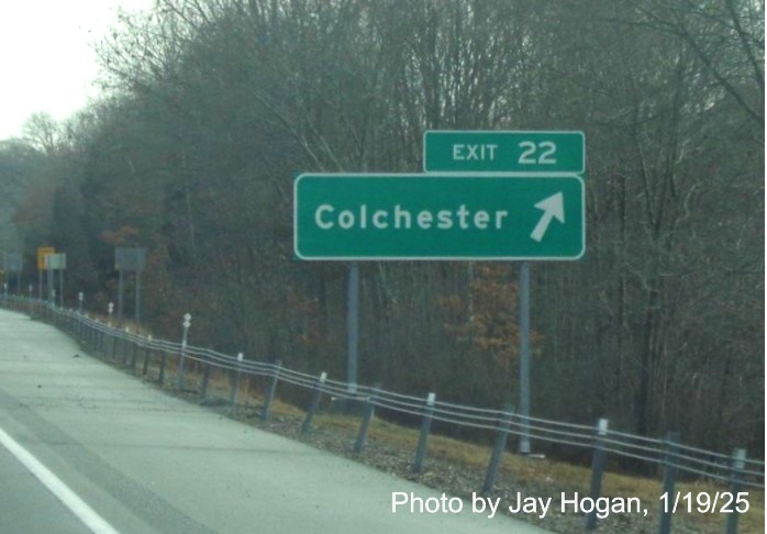 Image of ground mounted ramp sign for Colchester exit with new milepost based
	  exit number on CT 2 East in Colchester, by Jay Hogan, January 2025