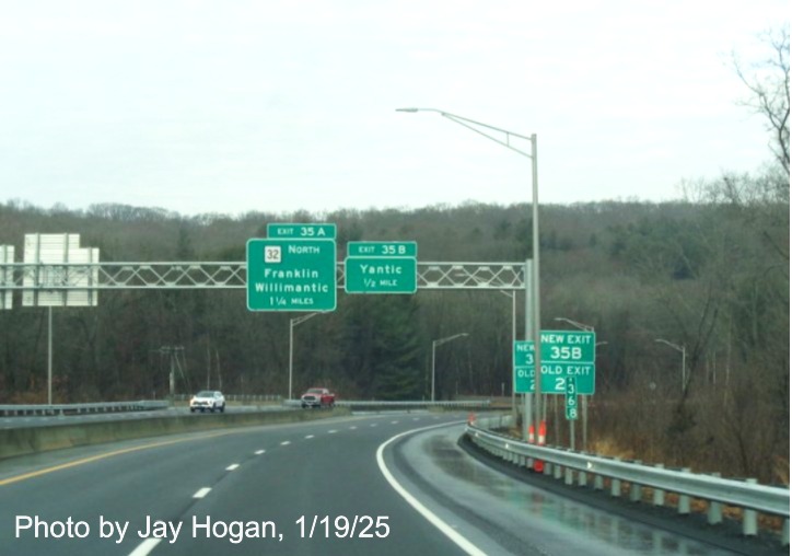 Image of overhead 1 1/4 Miles advance sign for CT 32 West exit with new milepost based
	  exit number on CT 2 West in Norwich, by Jay Hogan, January 2025