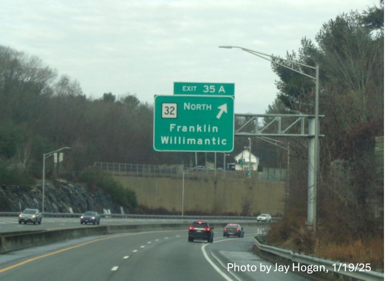 Image of overhead ramp sign for CT 32 exit with new milepost based
	  exit number on CT 2 West in Norwich, by Jay Hogan, January 2025