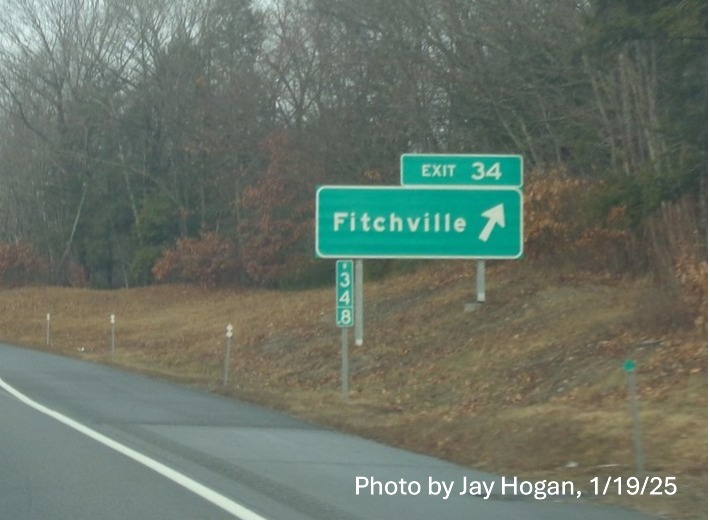 Image of ground mounted 1/2 mile advance sign for Fitchville exit with new milepost based
	  exit number on CT 2 West in Norwich, by Jay Hogan, January 2025