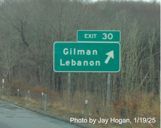 Image of ground mounted ramp sign for Gilman/Lebanon exit with new milepost based
	  exit number on CT 2 West in Gilman, by Jay Hogan, January 2025