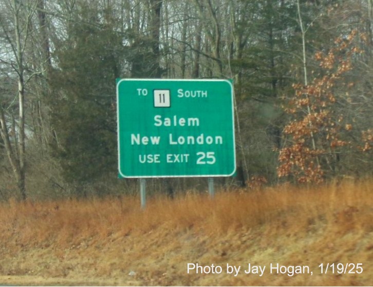 Image of ground mounted auxiliary sign for CT 354 exit with new milepost based
	  exit number on CT 2 West in Colchester, by Jay Hogan, January 2025