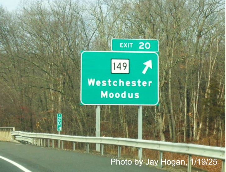 Image of ground mounted ramp sign for CT 149 exit with new milepost based
	  exit number on CT 2 West in Westchester, by Jay Hogan, January 2025