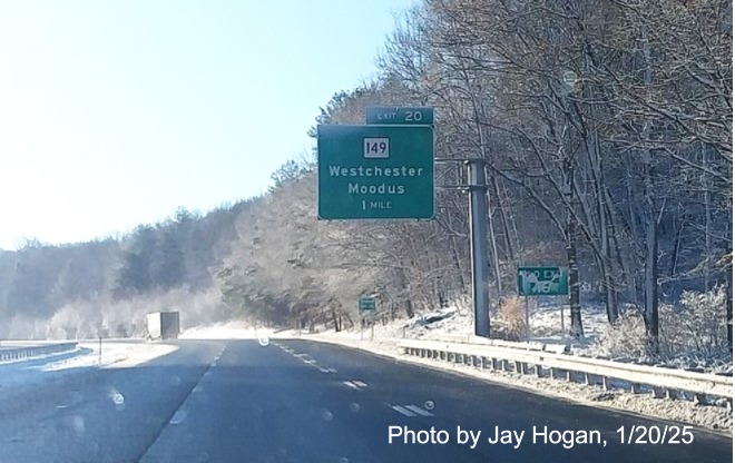 Image of overhead 1 Mile advance sign for CT 149 exit with new milepost based
	  exit number on CT 2 West in Westchester, by Jay Hogan, January 2025