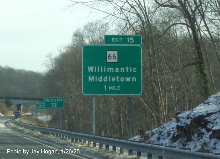 Image of ground mounted 1 mile advance sign for CT 66 exit with new milepost based
	  exit number and separate Old Exit 13 sign behind on CT 2 East in Marlborough, by Jay Hogan, January 2025