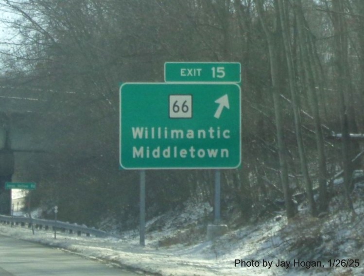 Image of ground mounted ramp sign for CT 66 exit with new milepost based
	  exit number on CT 2 East in Marlborough, by Jay Hogan, January 2025