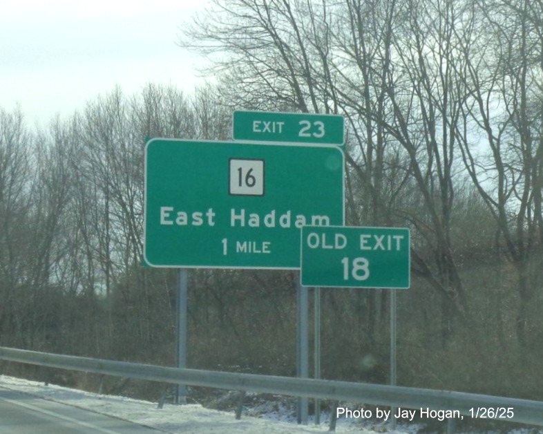 Image of ground mounted 1 Mile advance sign for CT 16 exit with new milepost based
	  exit number on CT 2 East in Colchester, by Jay Hogan, January 2025