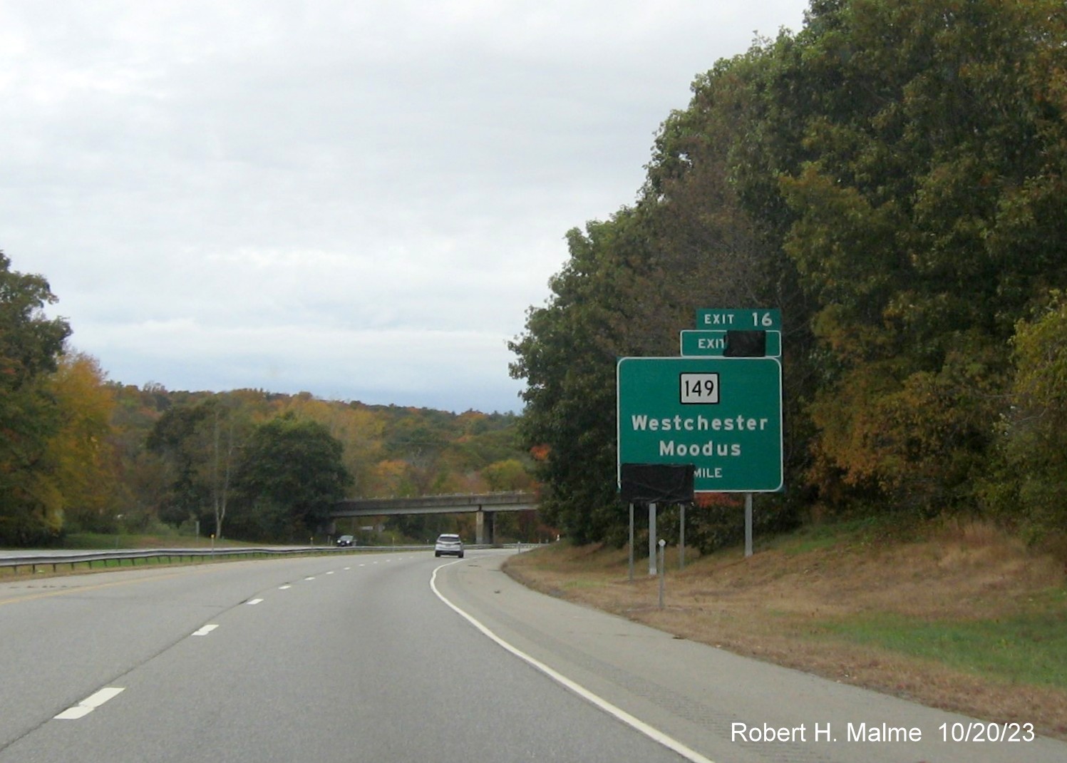 Image of recently placed 1 mile advance sign for CT 149 exit with future milepost based exit number covered up on CT 2 West in Colchester, October 2023
