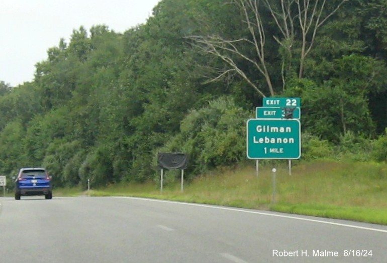 Image of 1 mile advance sign for Gilman Lebanon exit still with covered over future milepost based exit number on CT 2 West, August 2024