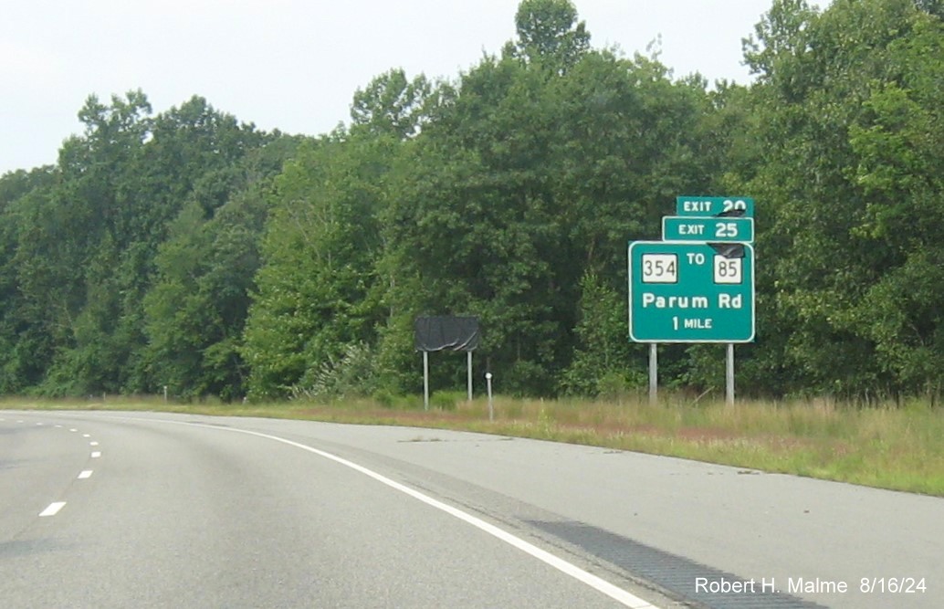 Image of 1 mile advance sign for CT 354 exit still with uncovered over future milepost based exit number 
       on CT 2 West in Colchester, August 2024