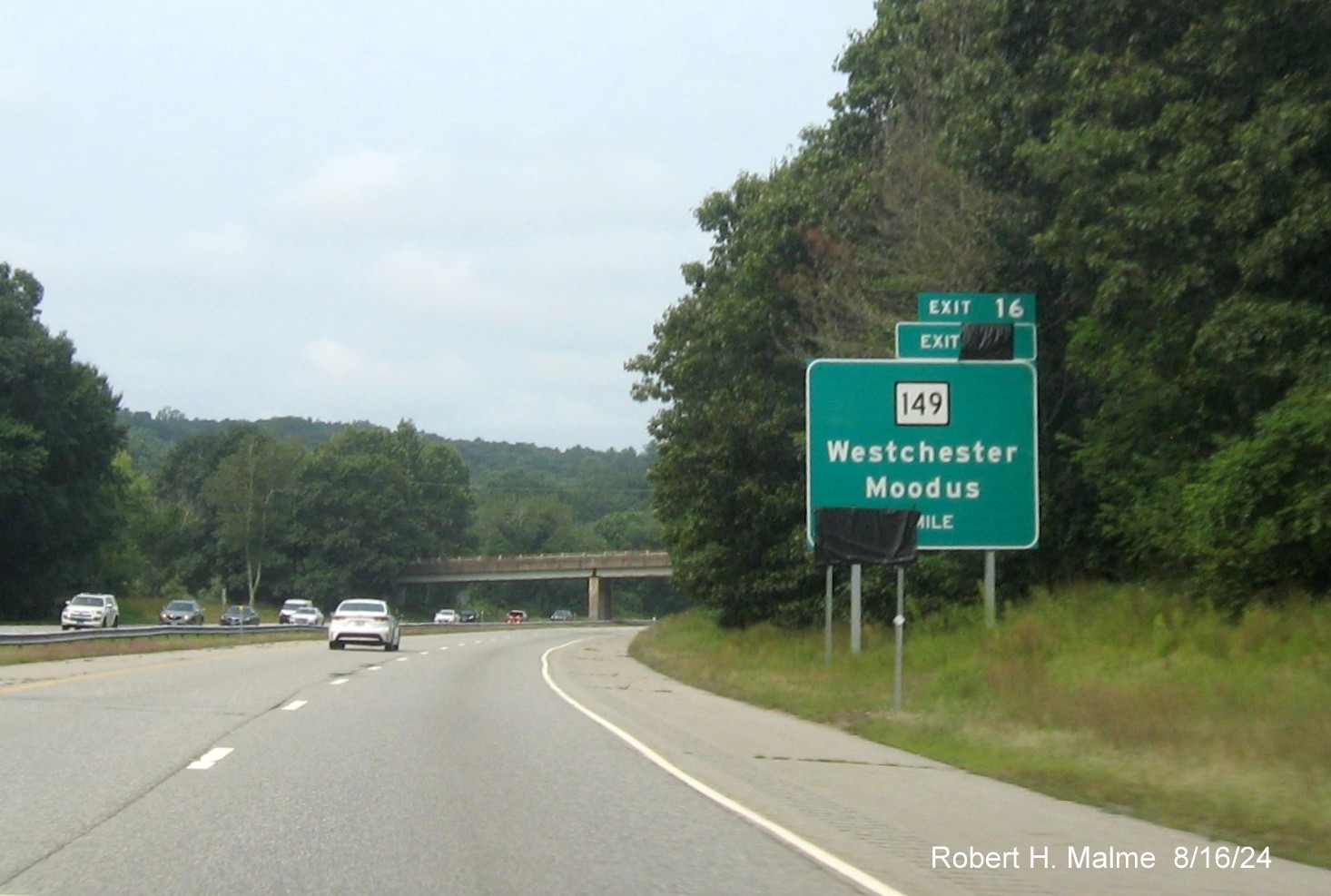 Image of 1 mile advance sign for CT 149 exit still with covered over future milepost based exit number 
       and Old Exit sign on CT 2 West in Hebron, August 2024