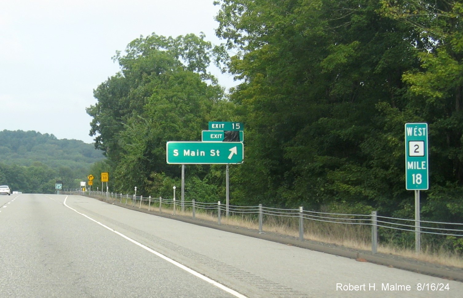 Image of ramp sign for South Main Street exit still with covered over future milepost based 
       exit number on CT 2 West in Marlborough, August 2024