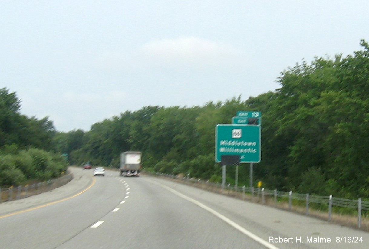 Image of 1 mile advance sign for CT 66 exit still with covered over future milepost based 
       exit number on CT 2 West in Marlborough, August 2024