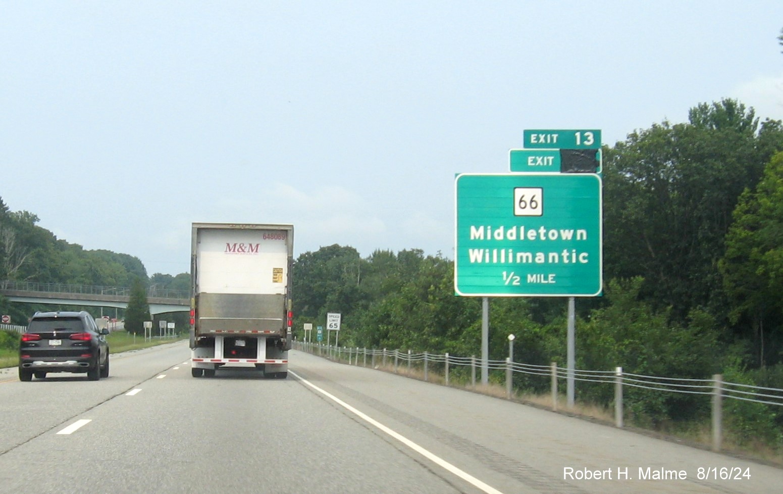 Image of 1/2 mile advance sign for CT 66 exit still with covered over future milepost based 
       exit number on CT 2 West in Marlborough, August 2024