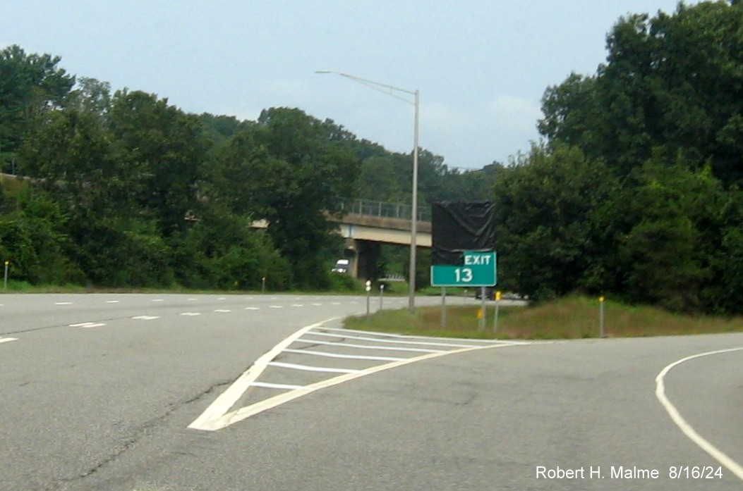 Image of gore sign for CT 66 exit still with covered over future milepost based 
       exit number on CT 2 West in Marlborough, August 2024