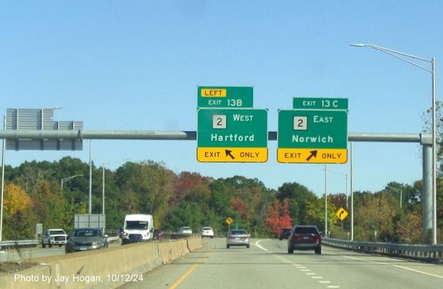 Image of recently placed overhead ramp signs for CT 2 exits with new milepost based exit numbers on 
      CT 3 North in Wethersfield, by Jay Hogan, October 2024