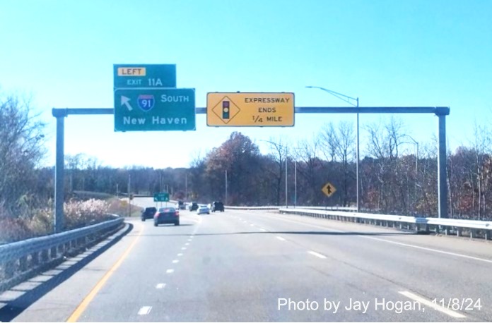 Image of recently placed overhead ramp sign for I-91 South exit with new milepost 
	   based exit number on CT 3 South in Glastonbury, by Jay Hogan, November 2024