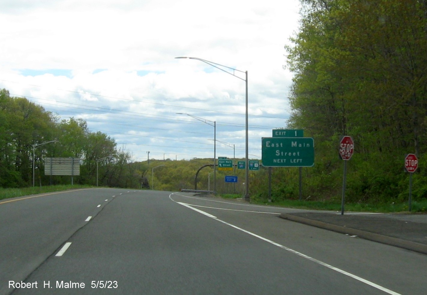 Image of 1/2 Mile advance sign for East Main Street exit with new milepost based exit number on CT 66 West in Meriden, May 2023