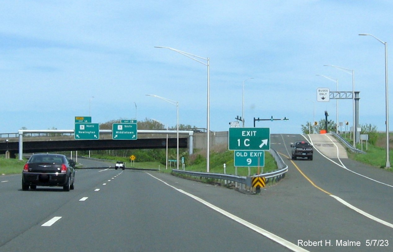 Image of gore sign for CT 71 exit with new milepost based exit number and Old Exit 9 sign below on CT 72 East, May 2023