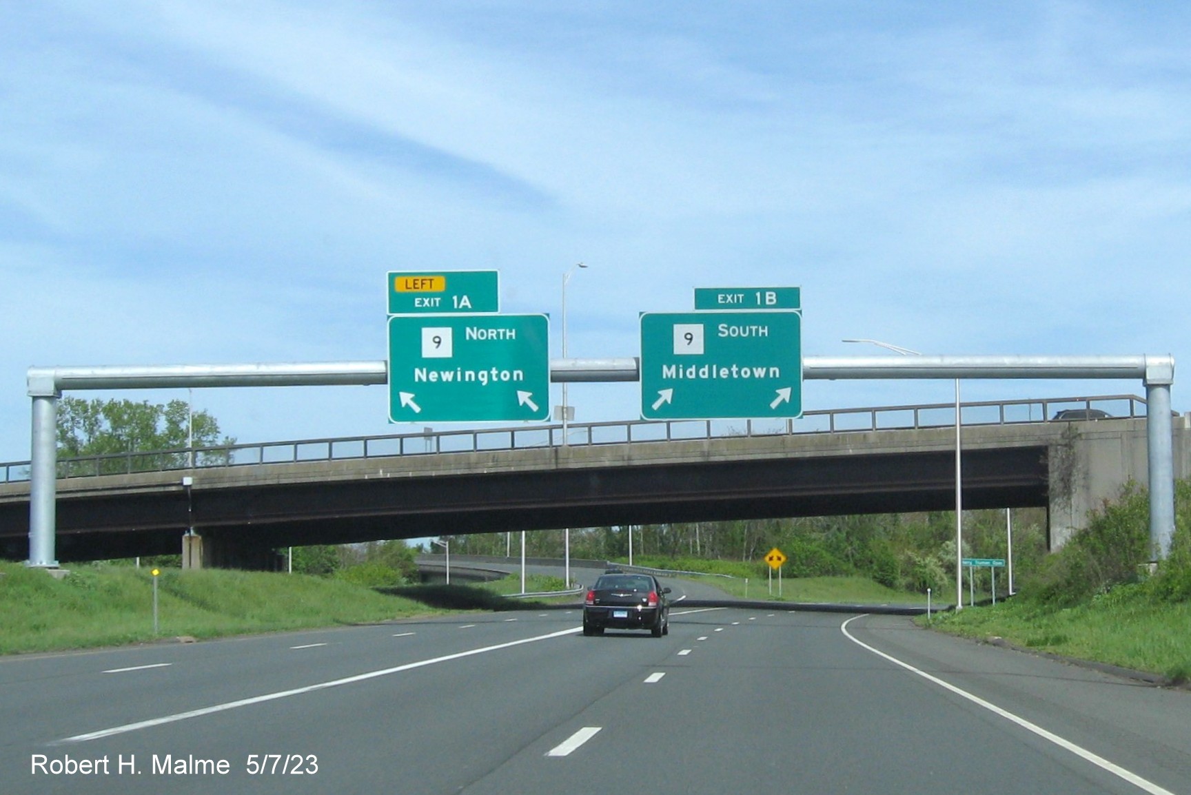 Image of 1/4 Mile advance for CT 9 exits with no exit numbers on CT 72 East in New Britain, May 2023