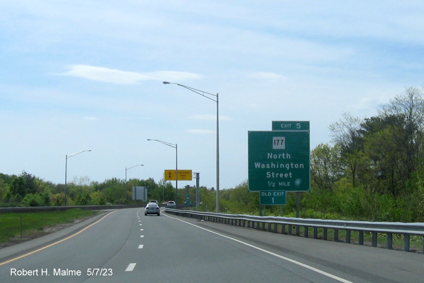 Image of 1/2 mile advance overhead sign for CT 177 exit with new milepost based exit number on CT 72 West in Bristol, May 2023