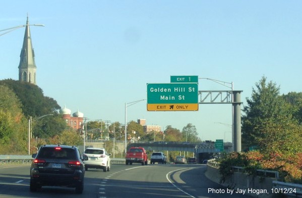 Image of overhead ramp sign for Golden Hill and Main Streets exit with new milepost based exit number on 
        CT 8/25 North in Bridgeport, Jay Hogan, October 2024