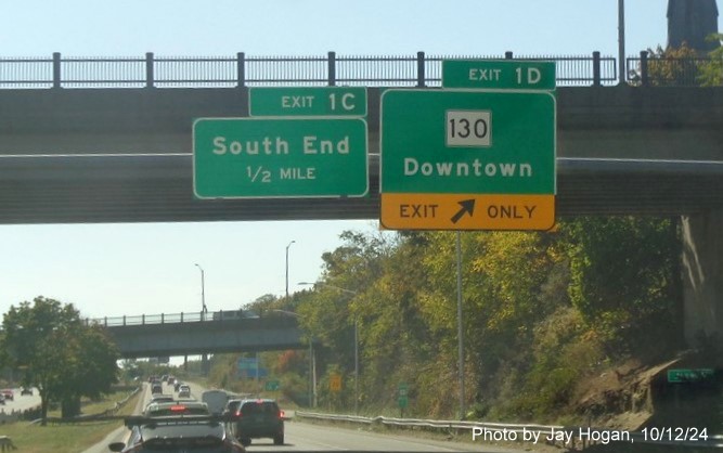 Image of overhead ramp sign for US 1 North exit with new milepost based exit number on CT 8/25 South in 
        Bridgeport, by Jay Hogan, October 2024