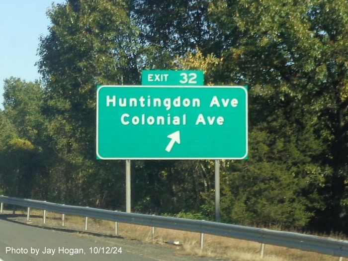 Image of ground mounted ramp sign for Huntingdon and Colonial Avenues with new milepost based 
        exit number on CT 8 North in Waterbury, by Jay Hogan, October 2024