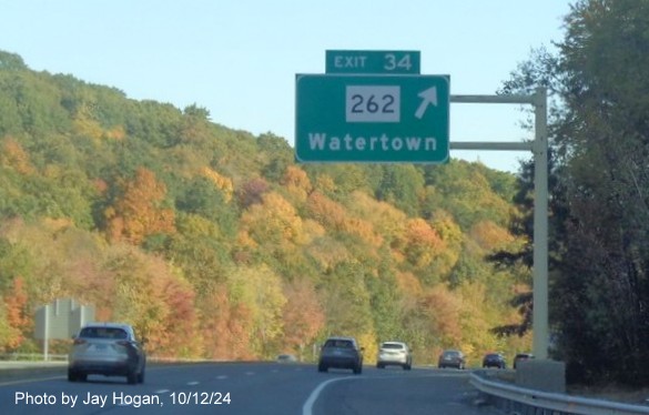 Image of overhead ramp sign for the CT 262 exit with new milepost based 
        exit number on CT 8 North in Watertown, by Jay Hogan, October 2024