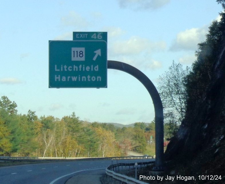 Image of overhead ramp sign for CT 118 exit with new milepost based 
        exit numbers on CT 8 North in Litchfield, by Jay Hogan, October 2024