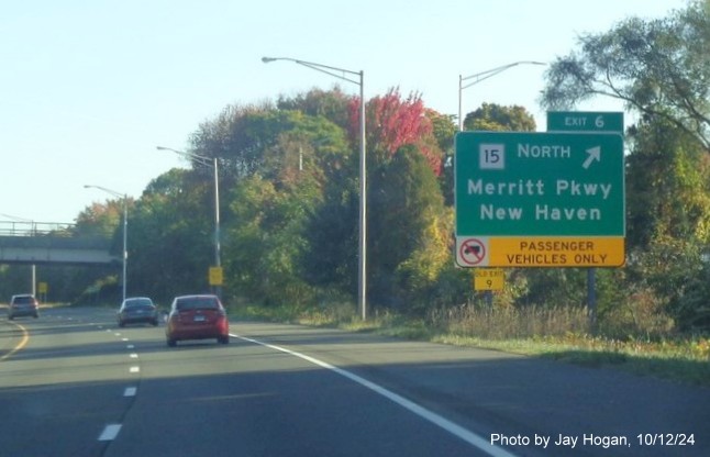 Image of ground mounted ramp sign for CT 15 North exit with new milepost based exit number on CT 8 
        North in Trumbull, by Jay Hogan, October 2024