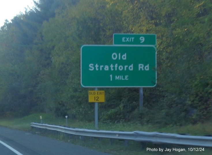 Image of ground mounted 1 mile advance sign for the Old Stratford Road exit with new milepost based exit number on CT 8 
        North in Shelton, by Jay Hogan, October 2024