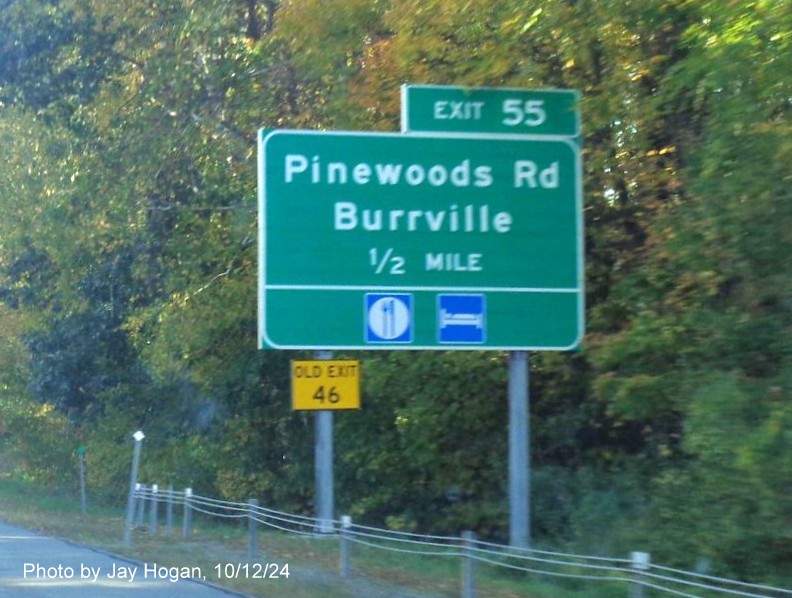 Image of ground mounted 1/2 Mile advance sign for Pinewood Road exit with new milepost exit number 
        on CT 8 North in Torrington, by Jay Hogan, October 2024