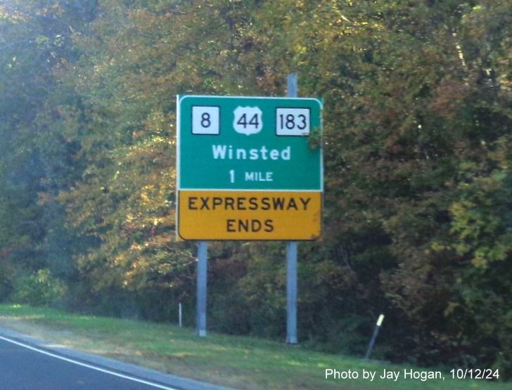 Image of ground mounted 1 Mile advance sign for CT 8/CT exit with old sequential exit number removed 
        on CT 8 North in Winsted, by Jay Hogan, October 2024