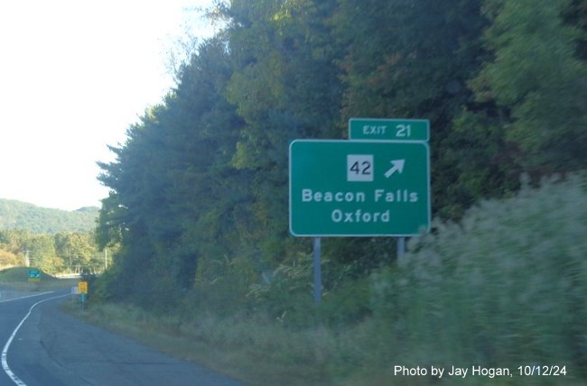 Image of ground mounted ramp sign for CT 42 exit with new milepost based exit number on CT 8 
        North in Beacon Falls, by Jay Hogan, October 2024