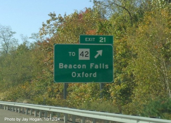 Image of ground mounted 1 mile advance sign for To CT 42 exit with new milepost based exit number on CT 8 
        South in Beacon Falls, by Jay Hogan, October 2024