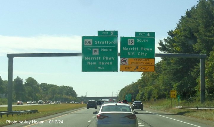 Image of overhead ramp sign for CT 15 South exit with new milepost based exit number on CT 8 
        South in Trumbull, by Jay Hogan, October 2024