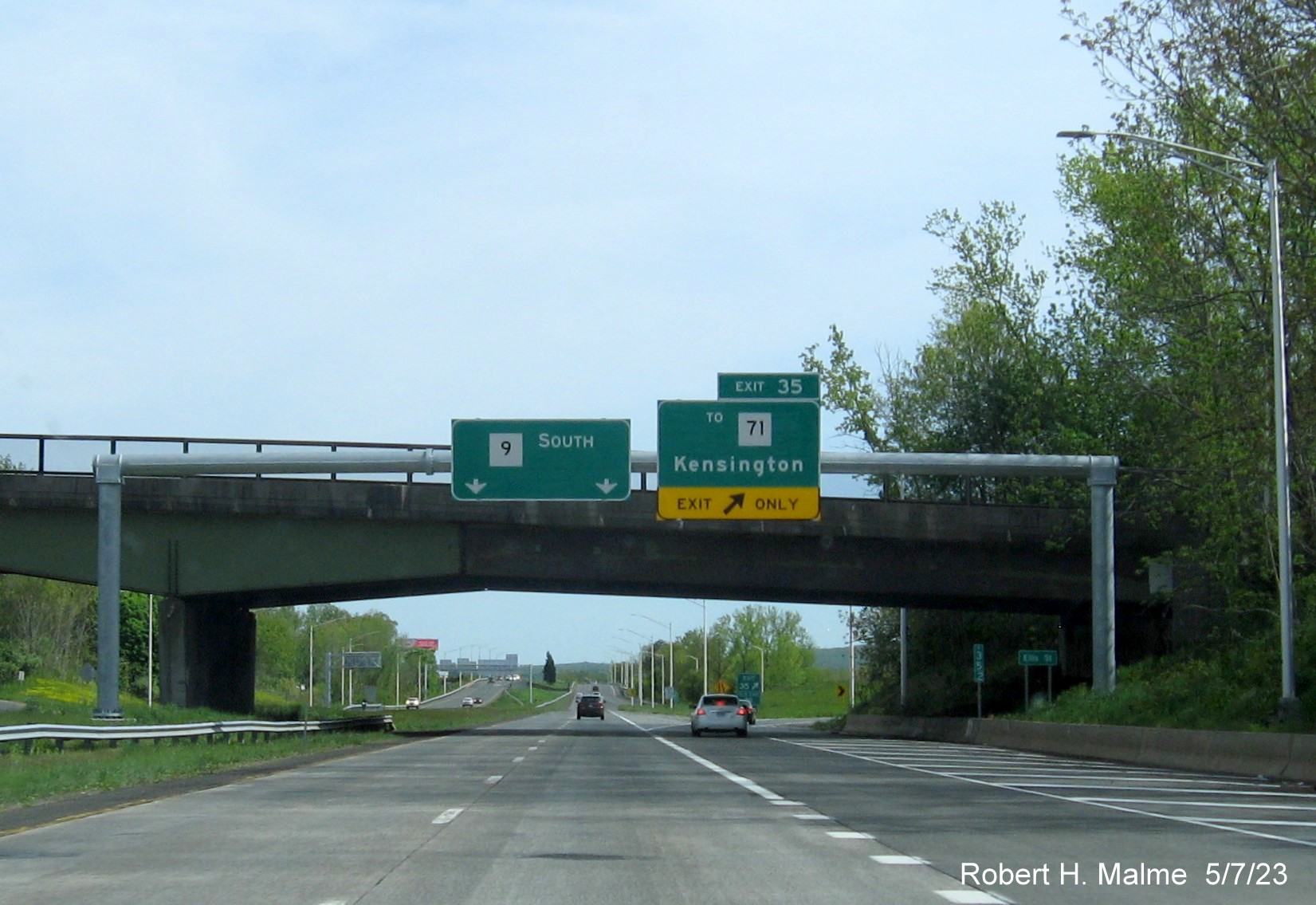 Image of overhead ramp sign for To CT 71 exit with new milepost based exit number on CT 9 South in New Britain, May 2023