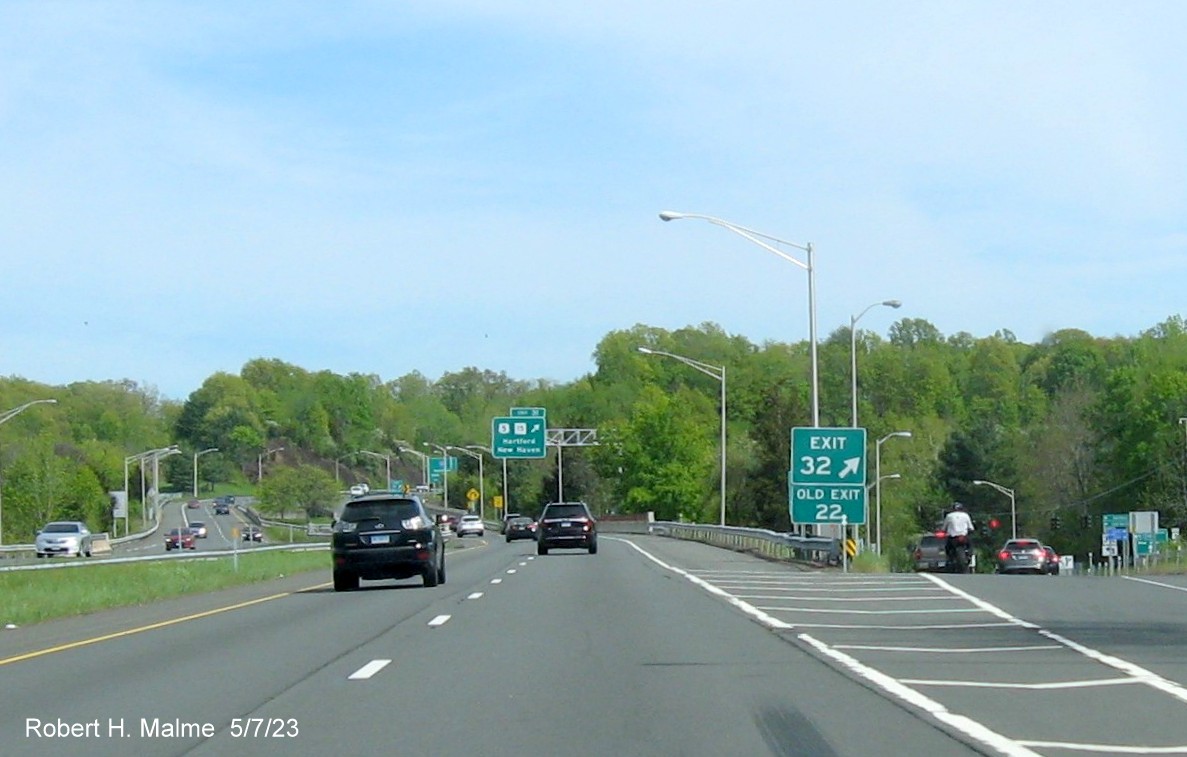 Image of gore sign for CT 372 exit with new milepost based exit number and Old Exit 22 sign below on CT 9 South in Berlin, May 2023