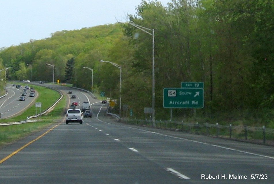 Image of overhead ramp sign for CT 154 exit with new milepost based exit number on CT 9 South in Durham, May 2023