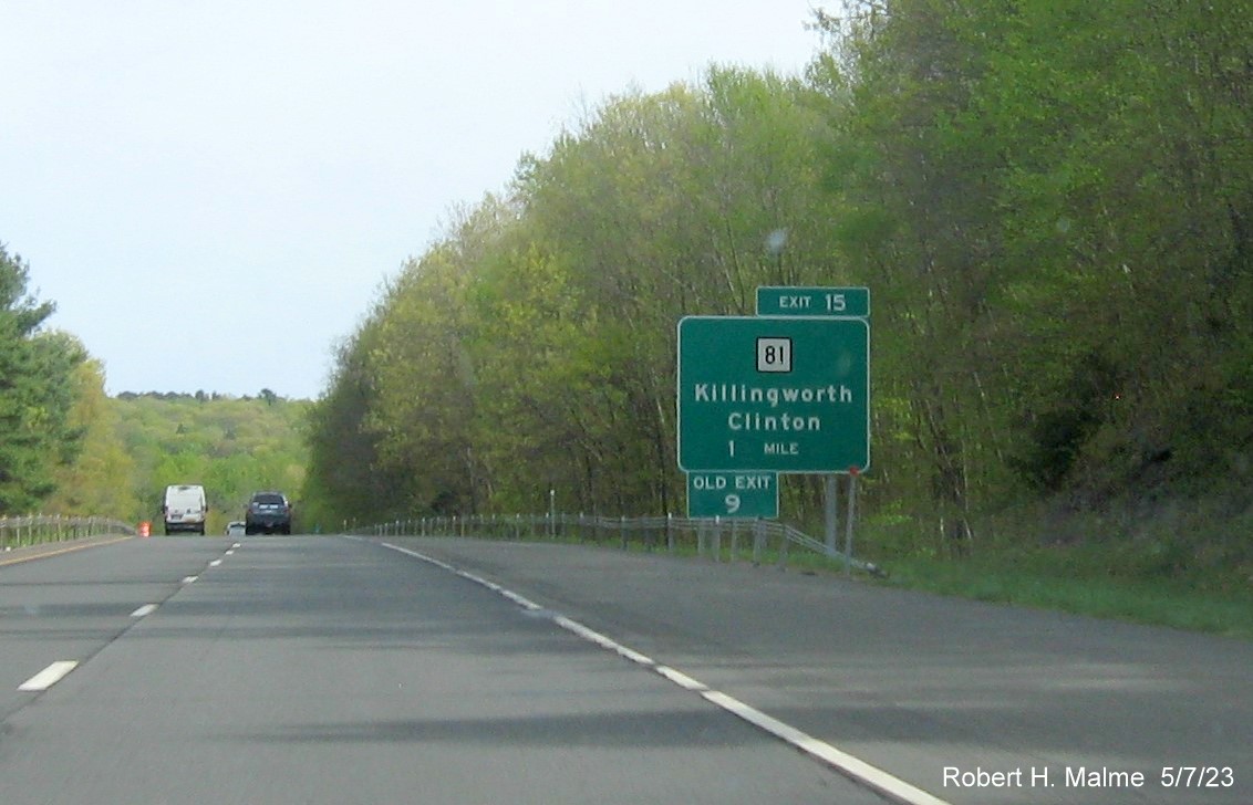 Image of 1 mile advance overhead sign for CT 81 exit with new milepost based exit number and Old Exit 9 sign below on CT 9 South in Killingworth, May 2023