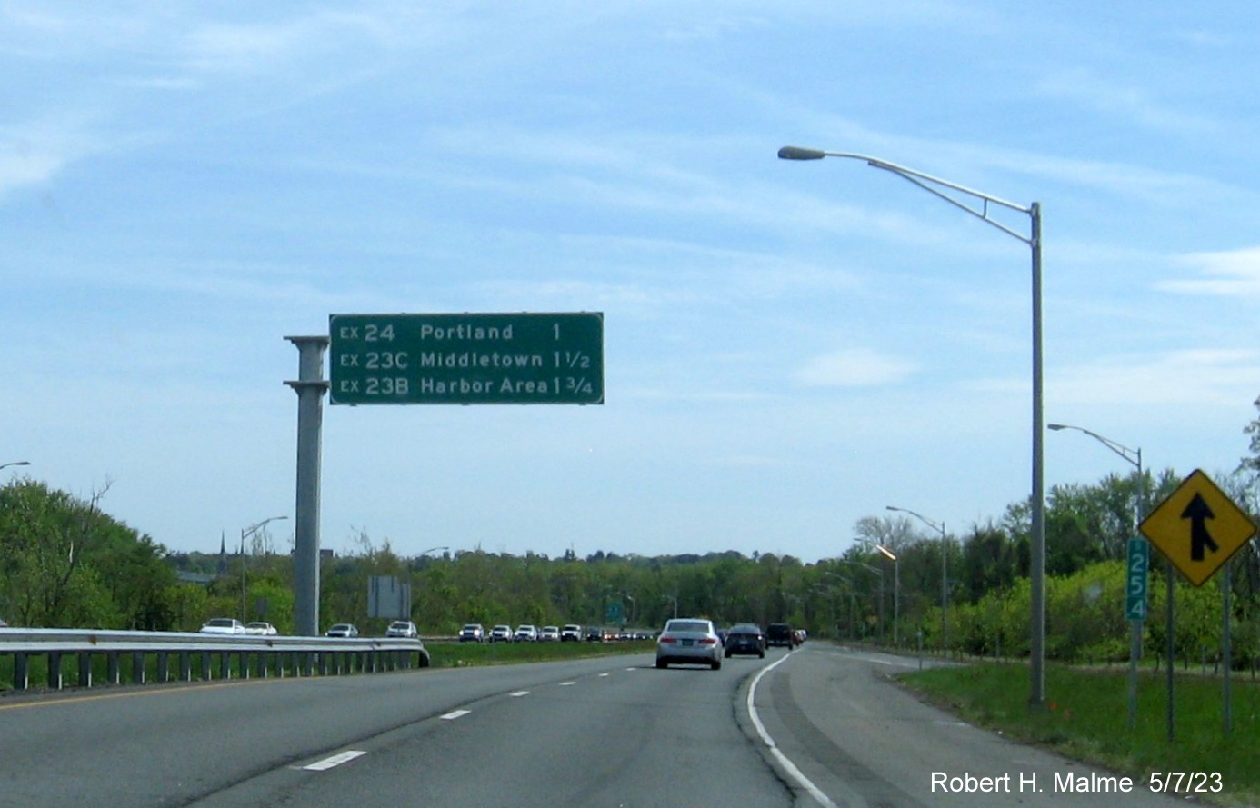 Image of overhead guide sign listing new milepost based exit numbers for Middletown exits on CT 9 South, May 2023