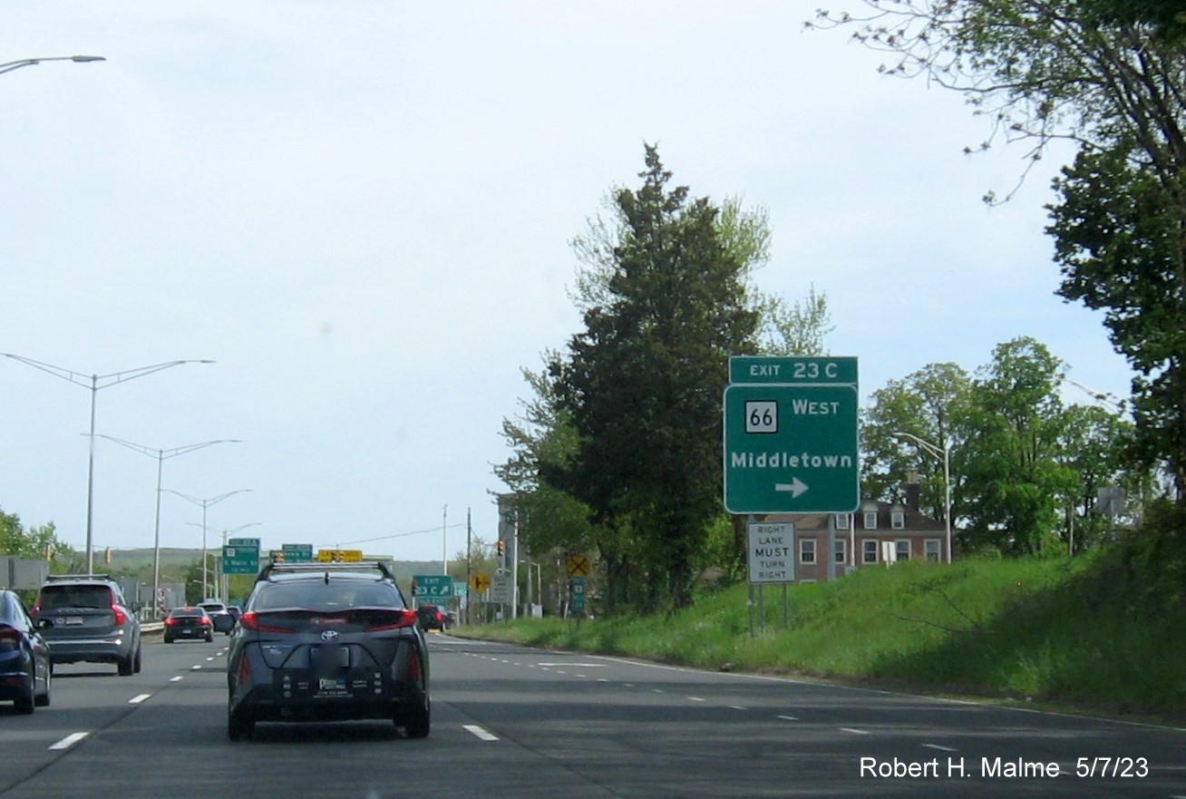 Image of ground mounted ramp sign for CT 66 West exit with new milepost based exit number on CT 9 South in Middletown, May 2023