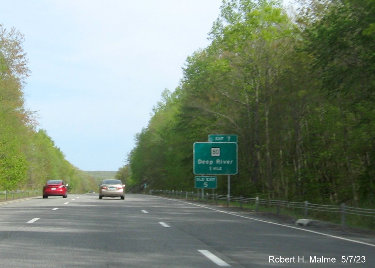 Image of ground mounted 1 mile advance sign for CT 80 exit with new milepost based exit number and separate Old Exit 5 sign in front on CT 9 South in Deep River, May 2023