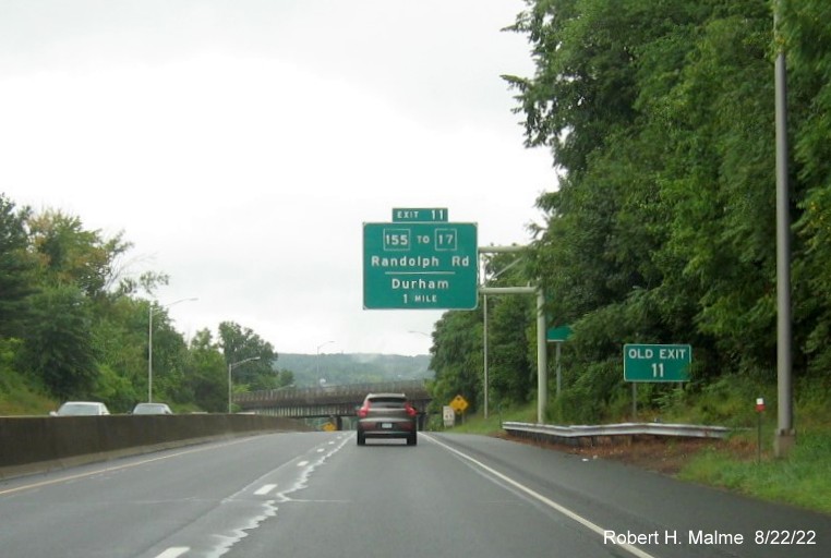 Image of old 1 mile advance overhead sign for CT 155 exit with new Old Exit sign in front on CT 9 South in Durham, August 2022
