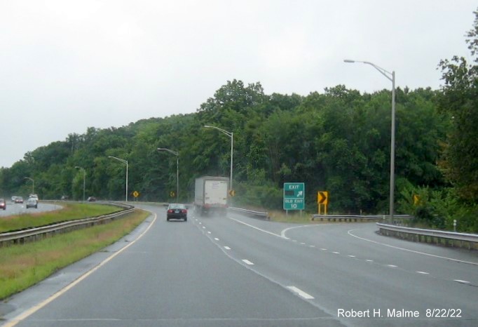 Image of gore sign for CT 154 South exit with covered over future milepost based exit number and Old Exit 10 sign below on CT 9 South in Durham, August 2022