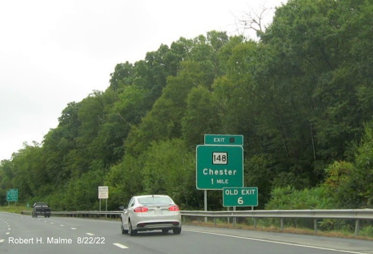 Image of new 1 mile advance sign for CT 148 exit with future milepost exit covered up and Old Exit 6 sign separately mounted in front on CT 9 South in Chester, August 2022