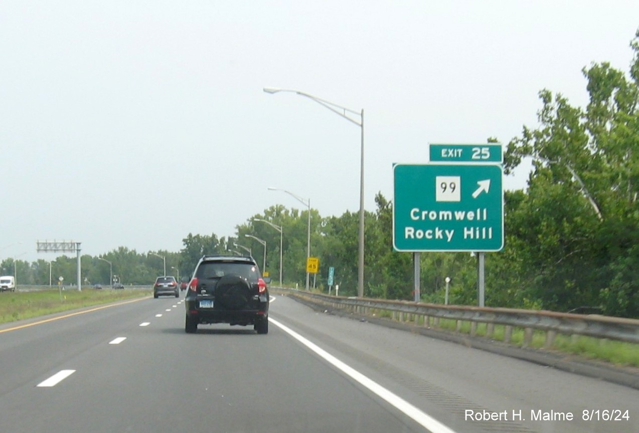 Image of ground mounted ramp sign for CT 99 exit with new milepost based exit number on CT 9 North in Middletown, August 2024